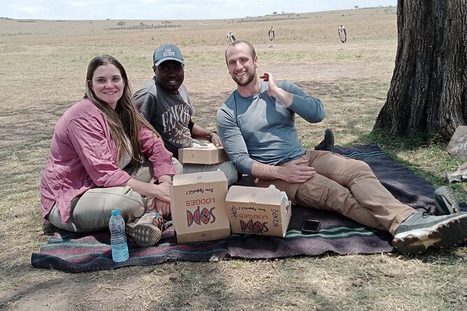 4-Day Masai Mara and Lake Nakuru Jeep Safari - Mara River hippos and crocodiles: where dusk stories start