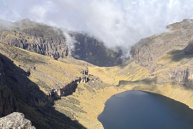4 Day Mount Kenya Trek Up Chogoria Down Sirimon - Day 1: Chogoria Banda to Lake Ellis, forests, falls, and the Giant’s Billiard Table