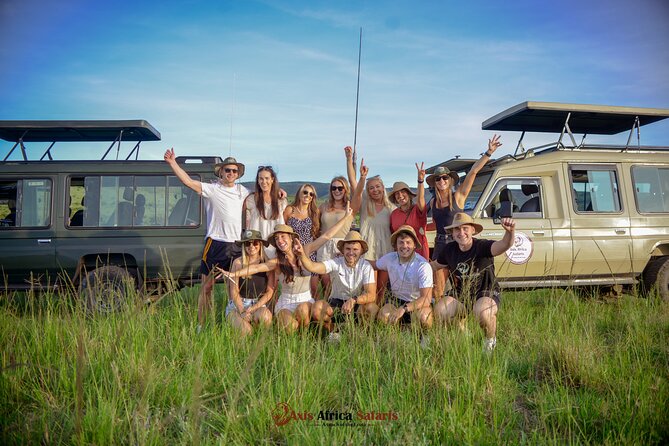 4 Days Safari Adventure Masai Mara and Nakuru Park Group - Day 4 at Lake Nakuru: flamingos, rhinos, and baboon cliff views