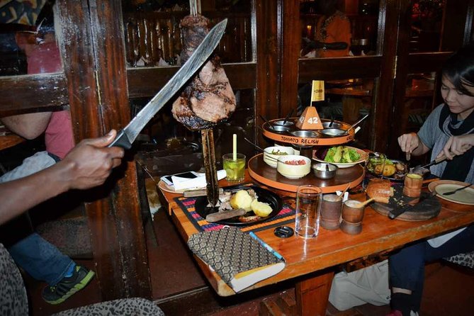 Carnivore Restaurant: Lunch or Dinner Experience in Nairobi - Table-side carving and the rhythm of the all-you-can-eat show