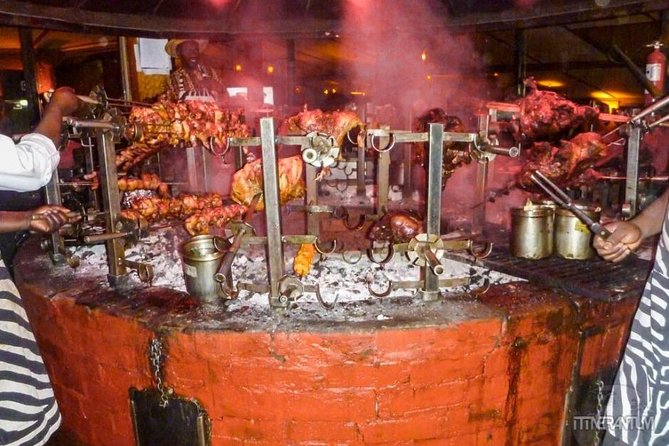 Carnivore Restaurant Nairobi Dinning experience-transport - The buffet at Carnivore: grilled meats, side dishes, and the unusual cuts