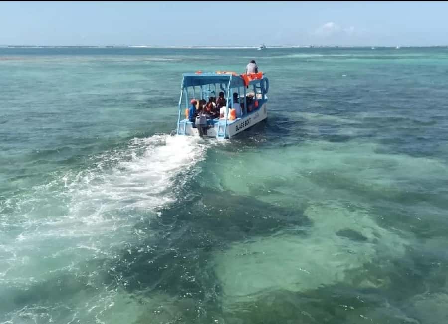 Diani Beach: Glass Boat Cruise to Robinson Island - Getting to Baobab Beach, then out to the sandbank area