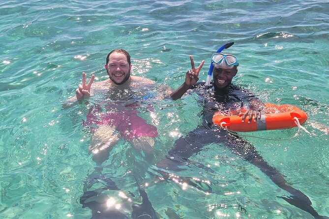 Full Day Dolphin Watching with Snorkeling in Wasini - Boat time, group size, and how guides shape the experience