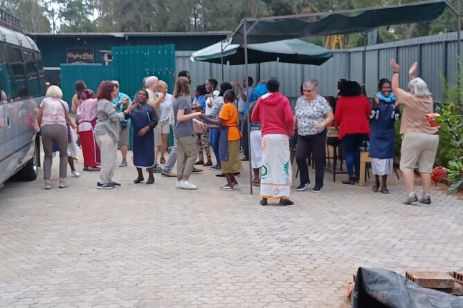 Half Day Excursion Tour in Nairobi - Stop 1 at Giraffe Centre: Rothschild Giraffes and the Molnar Hotel View