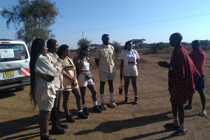 Masai village day tour. - Bisil stop for real-world Maasai life: market day energy