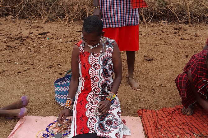 Masai Village half day Tour from Nairobi - Milking cows: hands-on learning, not just a photo moment