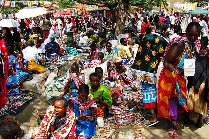 Nairobi Guided Cultural Shopping Experience Day Tour - Stop 4: Nairobi City Market, bargaining in a former hangar