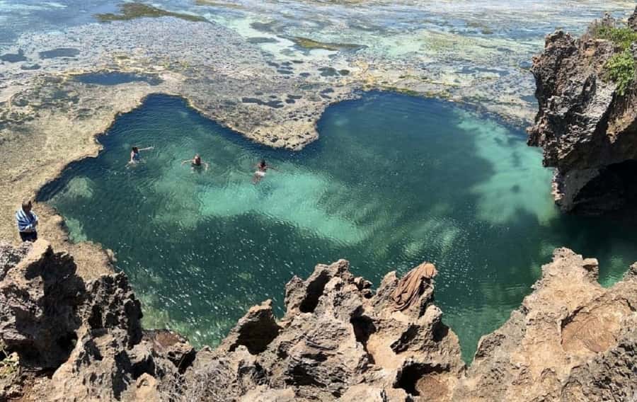 Tiwi Beach: Guided Tour to the African Pool - From the beach to the caves and cliffs, you walk where the ocean edits the rock